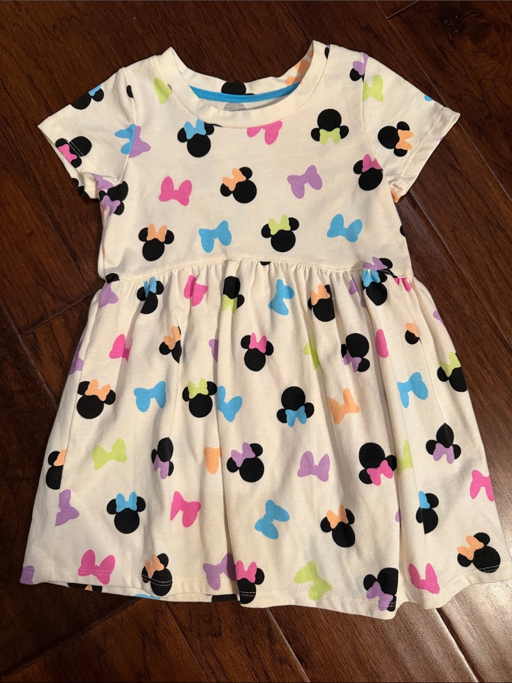 Disney Cream Dress with Black Minnie Silhouettes and Pastel Bows